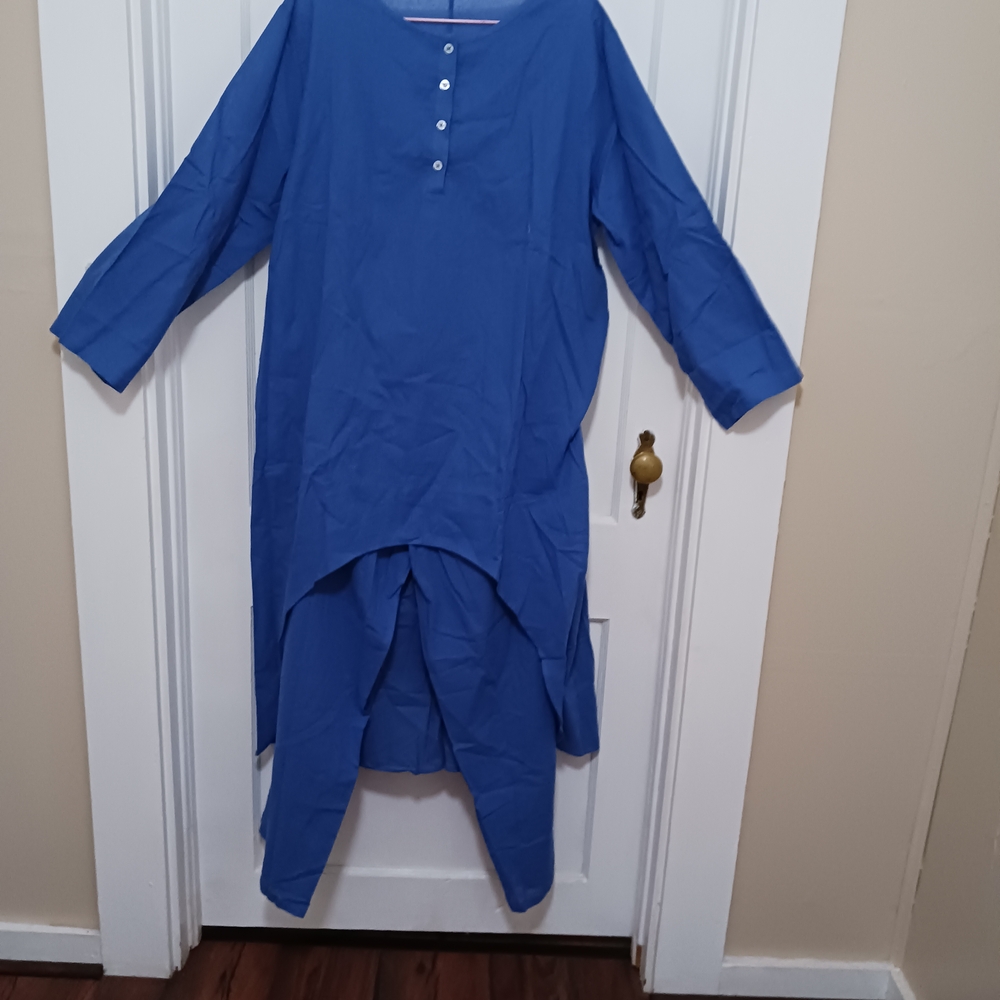 Woman's Blue Shirt And Pants